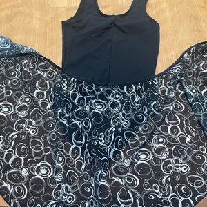 Black Mondor dance body suit and a Body Wrappers m-l Black & White Swirl ballet